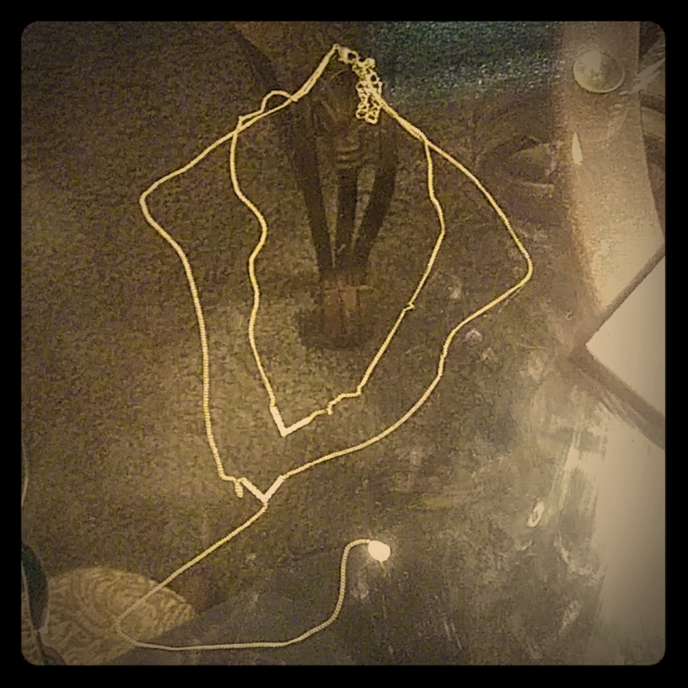 "2 tear Gold arrow necklace"